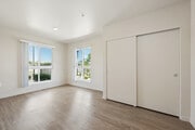 3BR, 2BA - 1044SF - Primary Bedroom - Juniper Grove