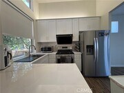 Photo - 7839 E Menton Ave Townhome