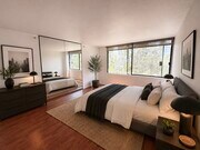 AI staged Primary Bedroom - 600 W 9th St Unit 814