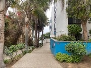 front door and walkway to beach - 575 Esplanade Unit 101