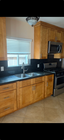 Granite countertops-lots of space for prepping. - 1308 N Hollywood Way Unit Apartment A
