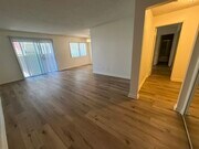 Floor plan D; living room - Sun Harbour Apartments