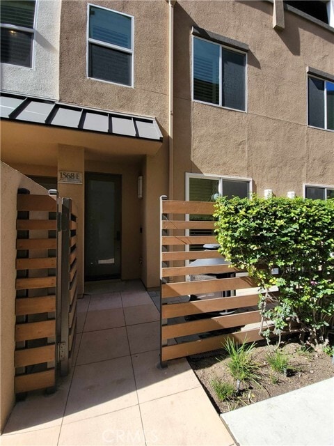 Building Photo - 1568 W Artesia Square Unit E