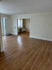 Living room looking toward den. - 1137 12th St Unit #9.    2 bedroom plus den