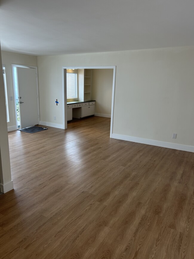 Living room looking toward den. - 1137 12th St Unit #9. 2 bedroom plus den