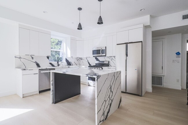 Photo - NEW CONSTRUCTION LUXURY 4 BED TOWNHOMES WITH ROOF DECKS Unit #11814 1/2