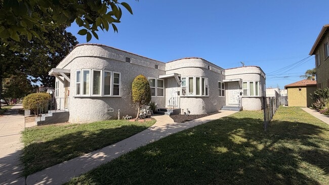 Building Photo - 6415 S Van Ness Ave Unit 6419
