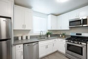 Kitchen 2BD 1BA Unit 14 - The Grand at Vista Village Apartments