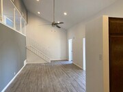 VIEW FROM DOWNSTAIRS - Woodley Plaza Apartments