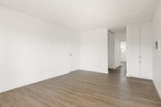 Spacious living rooms designed for comfort and style. - Park Apartments