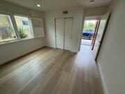 1ST BEDROOM NEW FLOORING - 646 N Serrano Ave Apartment