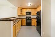 3BR, 1BA - 1,052SF - Kitchen - Arbor on Date Apartments