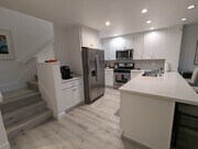 kitchen, stairs to 2nd floor - 20 Corsica Dr Townhome