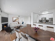 Wide Angle view of Dinning/Kitchen/Living room - 141 S Clark Dr Condo Unit 408