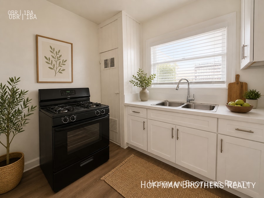 Photo - 314 3/4-314 W 50th St
