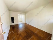 Unit 5 Living Room - 11682 Darlington Ave Apartments