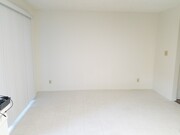 Dining room with patio door leading to garage - 120 s - 725 Windwood Dr