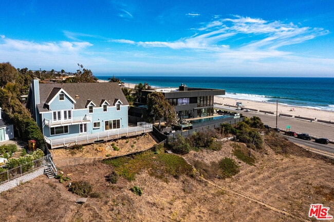 Building Photo - 6457 Surfside Way