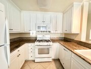 Photo - Bright & Airy 1BD/1BA Condo in Gated Community | Private Porch, Pool & Gym Unit 17C