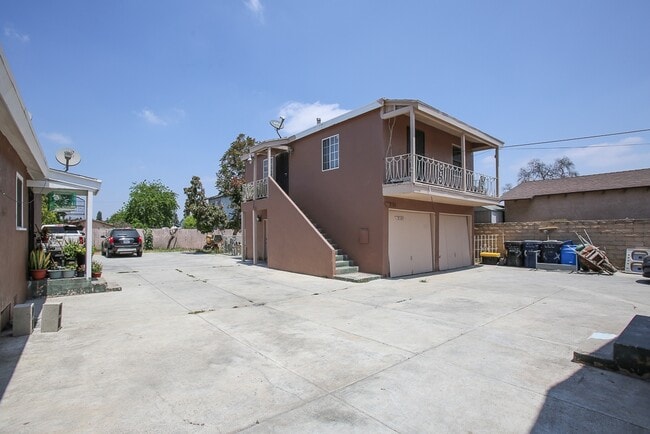 Building Photo - 2105 E 124th St Unit 2