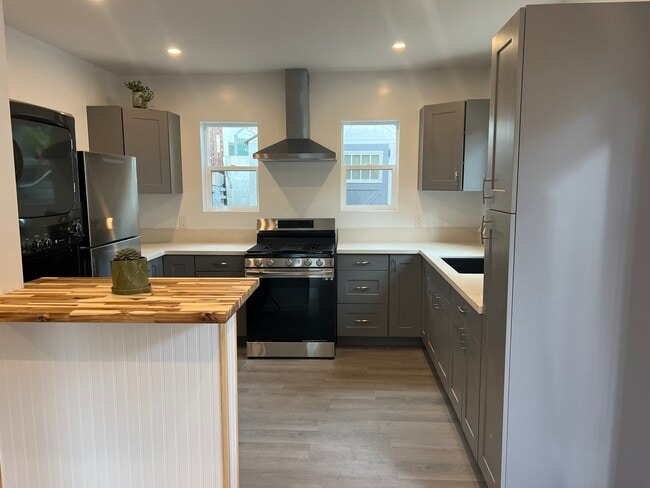 Kitchen includes appliances and plenty of cabinet space - 9300 Benson Way Apartments Unit B