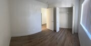 Bedroom door, closet and bedroom - 200 S Carondelet St Unit Apt 2