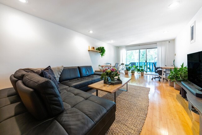 Large sliding glass doors to patio. - 1255 10th St Unit 106