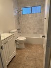 Second bathroom with new tub and surround - 4475 Dale Ave Unit Westwood Village