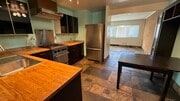 Kitchen with chefs stove - 1320 Mohawk St Unit 2 townhouse