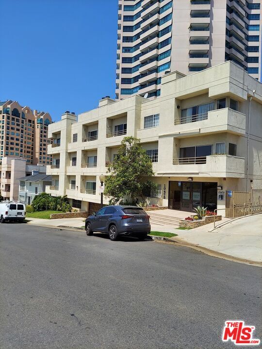 Building Photo - 10475 Ashton Ave Unit 201