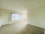 Living room, entry door - 1328 Barry Ave