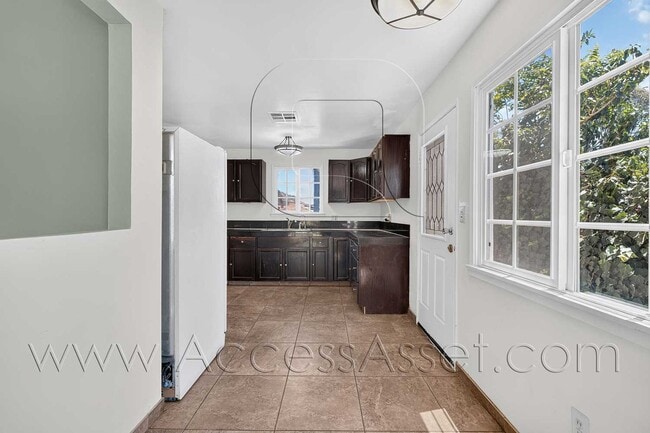 Photo - Charming 4 Bedroom Home with Private Yard & Garage Parking