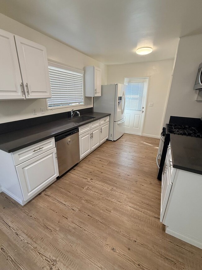 Photo - 4 bedroom home in LB with Large backyard now ready to rent!