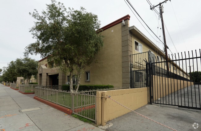 Building Photo - 15704 - 15724 Orange Avenue