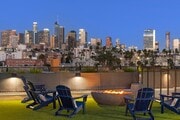 Rooftop Firepit with City Skyline Views - Kanvas Apartments