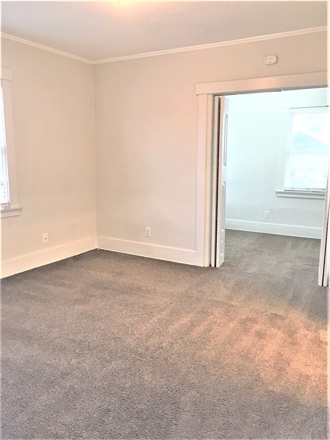 Living room into bedroom - 3047 E 6th St Unit 3047 East 6th Street