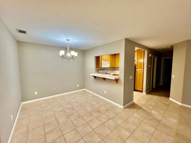 Building Photo - Welcome to this beautiful 3-bedroom, 2-bathroom condo in the desirable Avalon at Eagles Crossing Unit 203