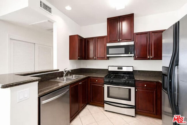 Photo - 13941 Sherman Way Unit 205