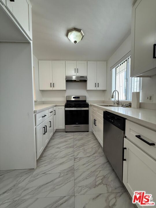 Building Photo - 1038 Thompson Ave Unit Apt 3