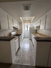 Kitchen Overview - 121 S Swall Dr Apartments Unit 208