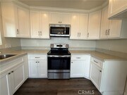 Photo - 665 W 34th St Apartment Unit 8