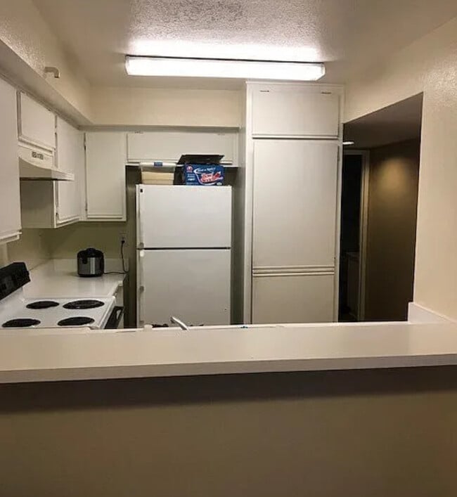 Stove and Refrigerator are now updated - 15000 Downey Ave Unit #142