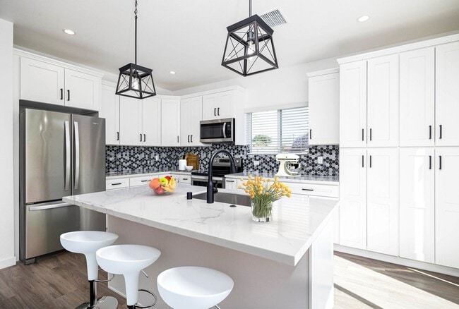 Photo - 4bd/2ba home with AC, off street parking and private yard!