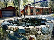 Front yard wishing well - 7627 Pine Blvd House