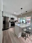 Photo - 10124-10123 3 Oaks Way House