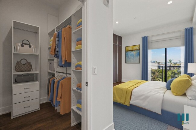 Bedroom with Walk-In Closet, Built-In Cabinets, and Balcony - Cole Grove by Wiseman