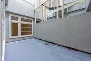 1BR, 1BA - 978SF - PATIO - Spring Arcade Building