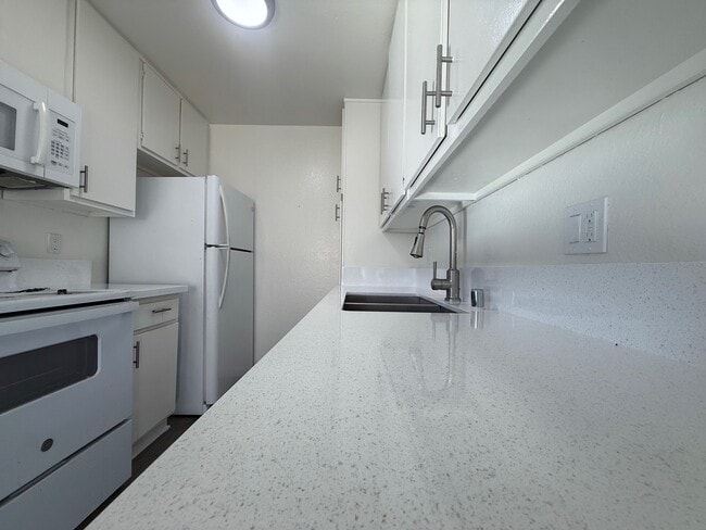 Modernized countertops - Western Serrano Ave Apartments