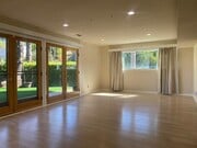 Large open living room French doors natural light - 4421 Grimes Pl