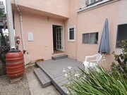 your back porch, looks into the back garden - 663 Marine St Unit B